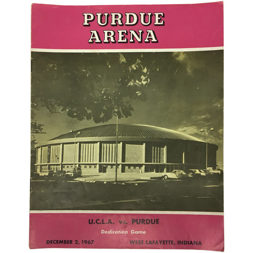 front of magazine with a picture of an arena